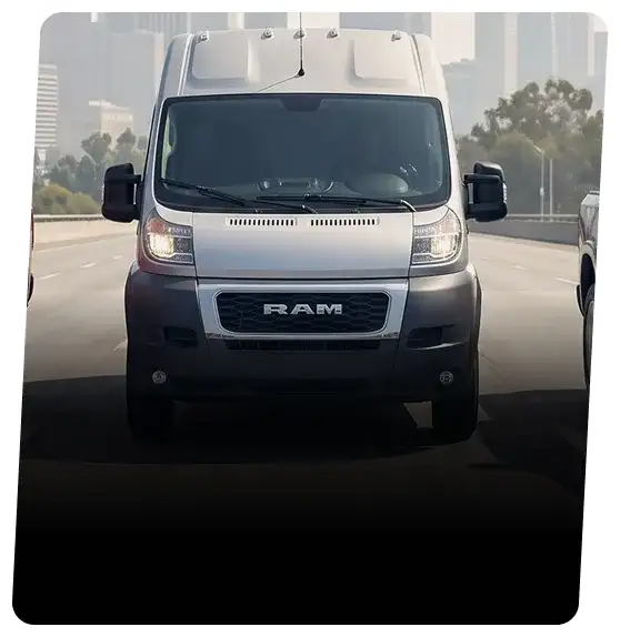 White Ram compact van on a city street