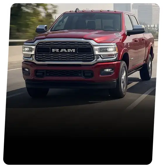 Red Ram truck on a city street