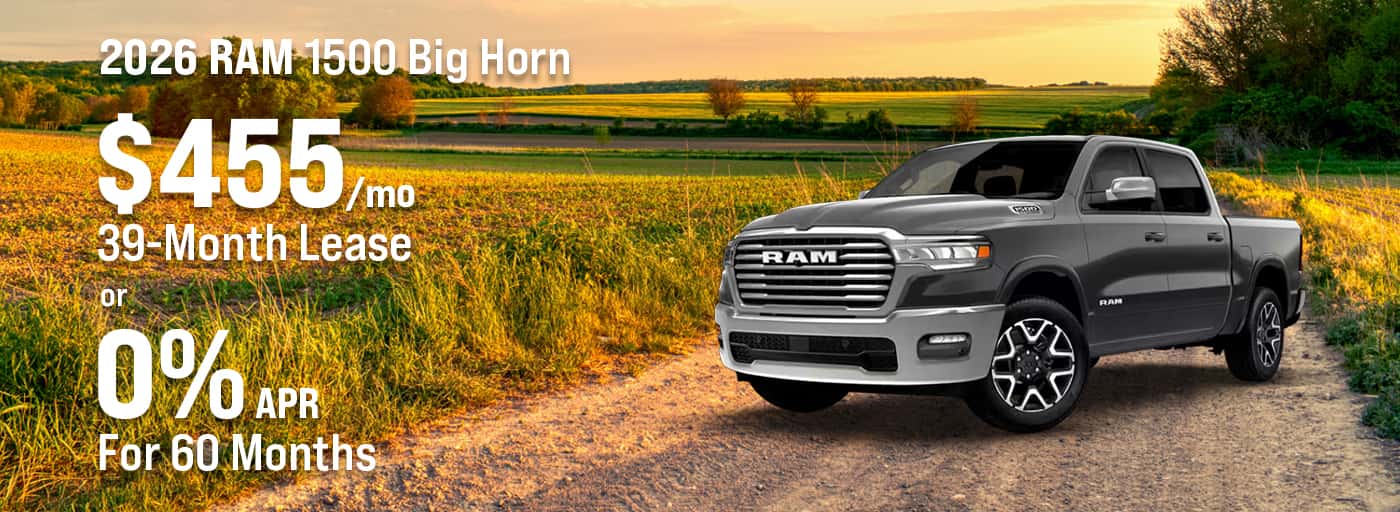 2026 RAM 1500 Big Horn pickup truck shown in a three-quarter front view, featuring a bold grille, four-door crew cab design, alloy wheels, and a spacious truck bed.