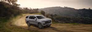 chevy tahoe drifting on dirt road