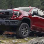 2025 GMC Sierra 1500 climbing over rocks