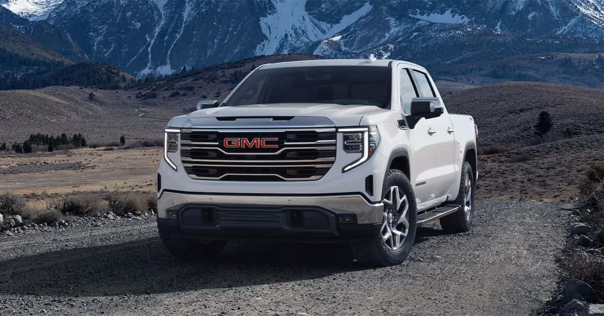 2024 GMC Sierra 1500 parked in front of mountains