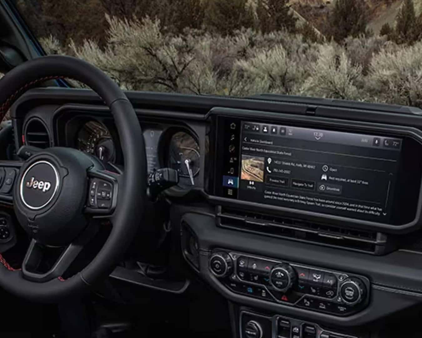 Interior dashboard shot of the 2026 Jeep Wrangler.