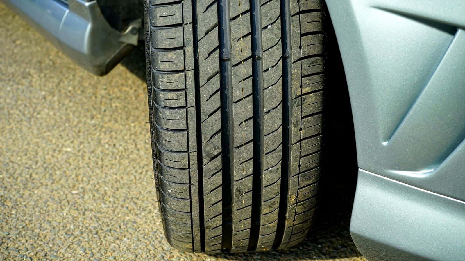 Close-up of tire tread depth on a car tire