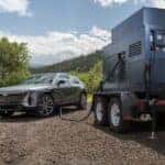 A car being charged by a portable generator