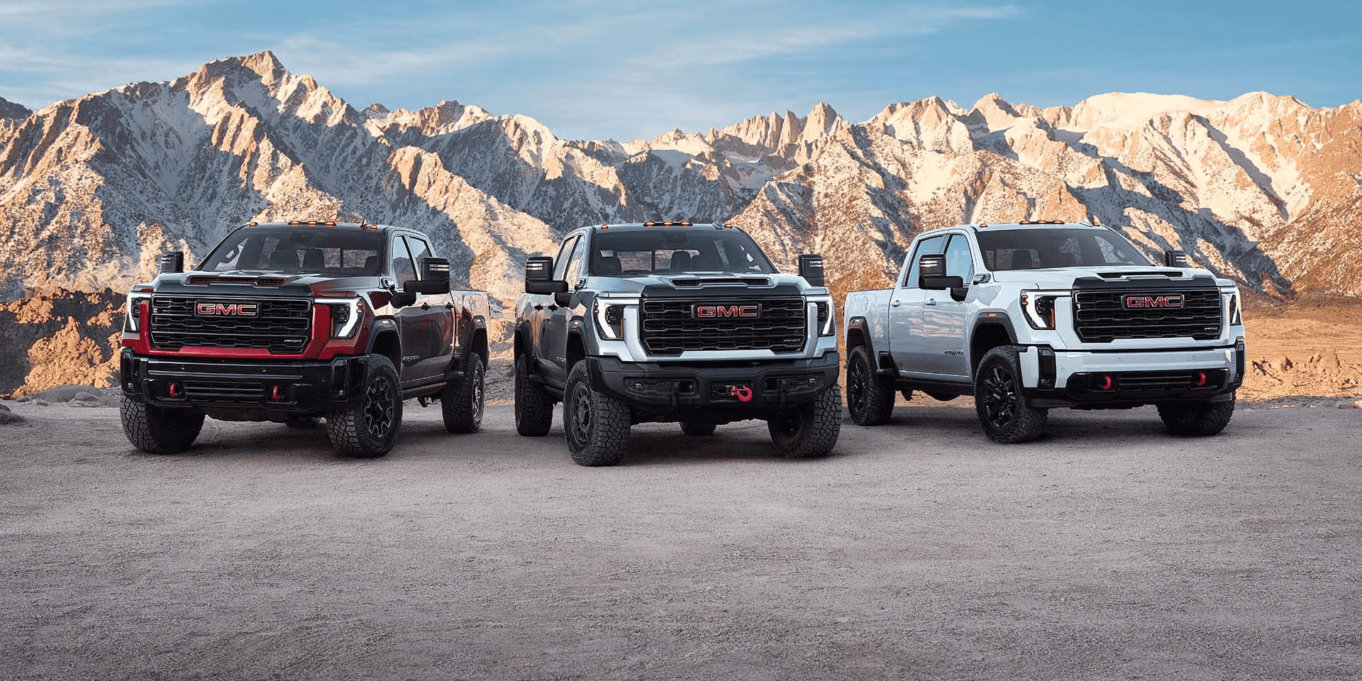 three 2025 gmc sierra hd trucks
