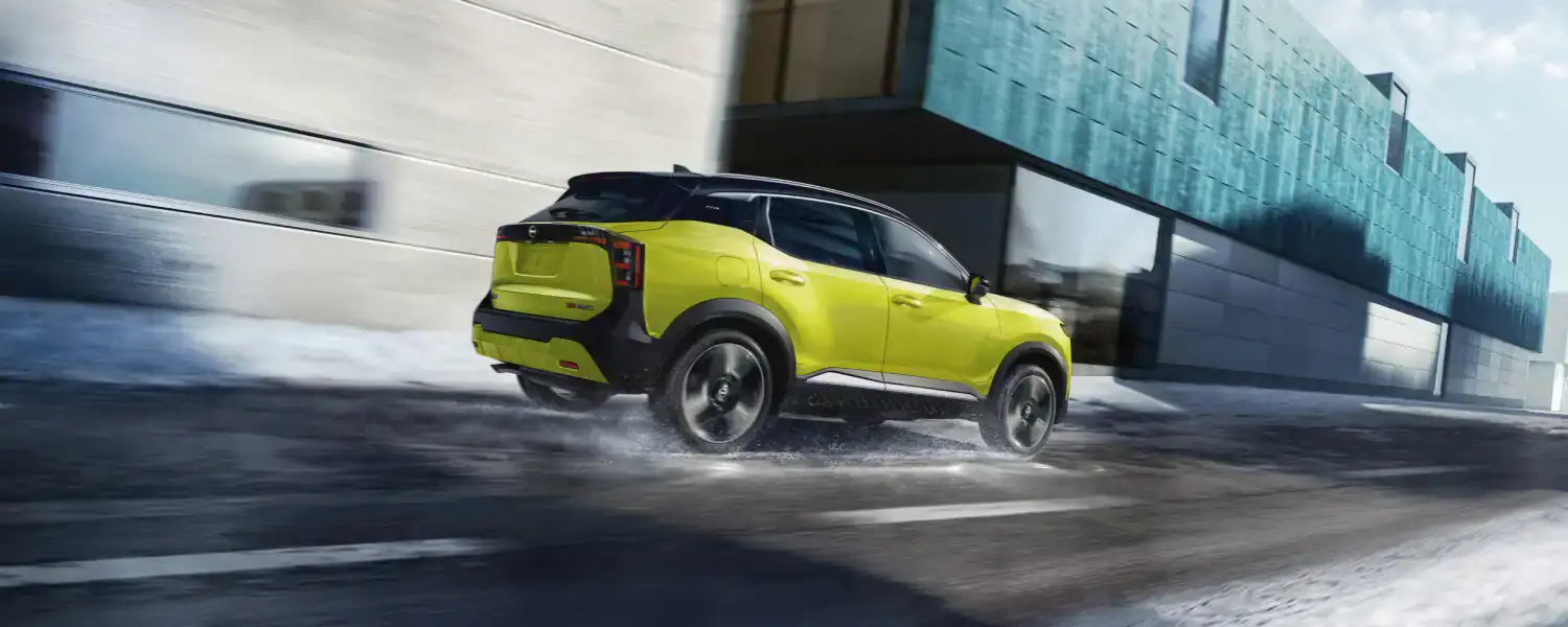 2026 Nissan Kicks Driving on Open Road