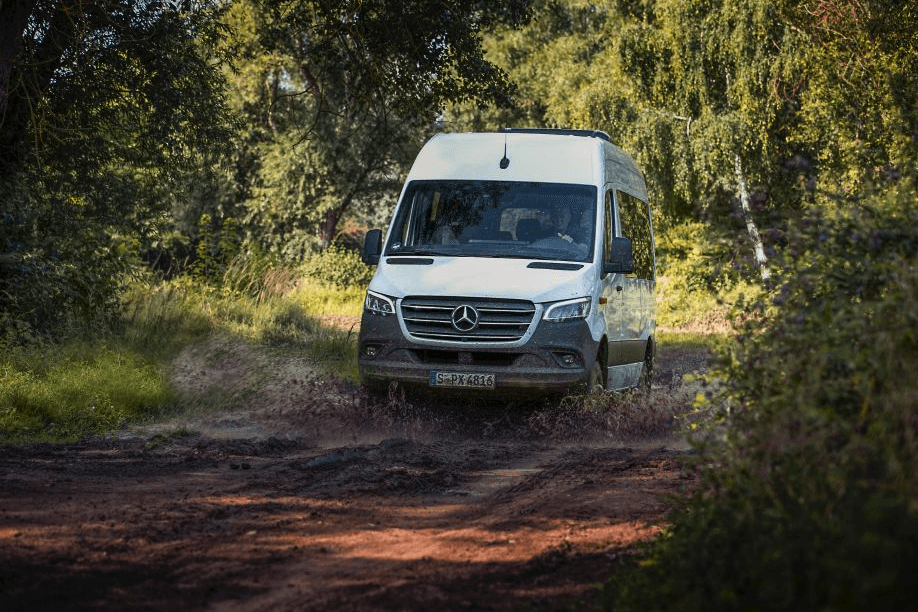  Mercedes-Benz Sprinter parked by a curb in a downtown area