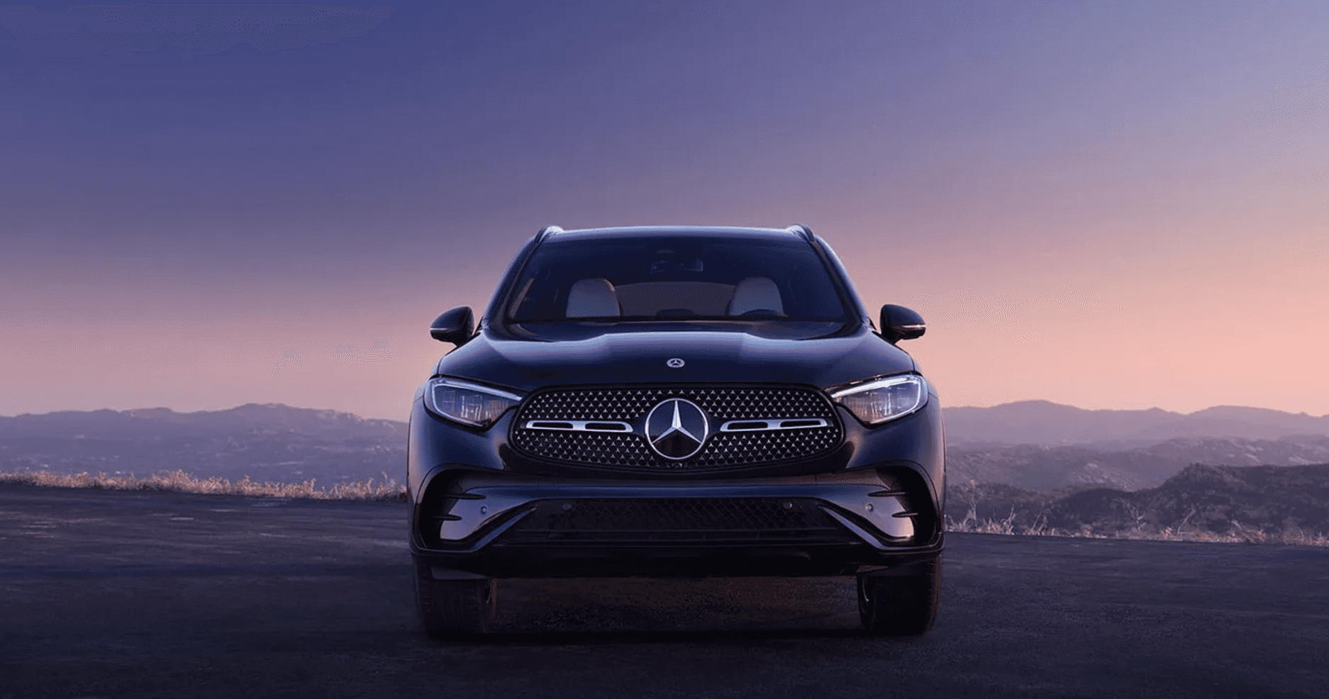 New Mercedes-Benz GLC SUV parked at a lookout point