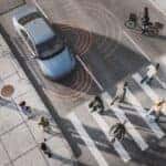 Advanced vehicle safety sensors detecting pedestrians at a busy crosswalk in Gilbert, AZ