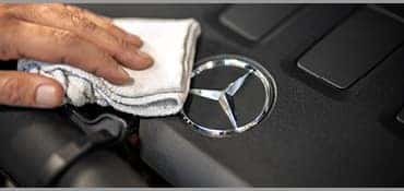 hand cleaning engine with mercedes-benz logo