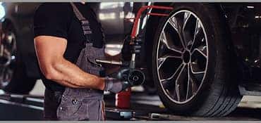 service tech checking tires