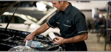 mechanic working on engine