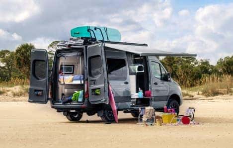 Upfitted Mercedes-Benz van parked at the beach