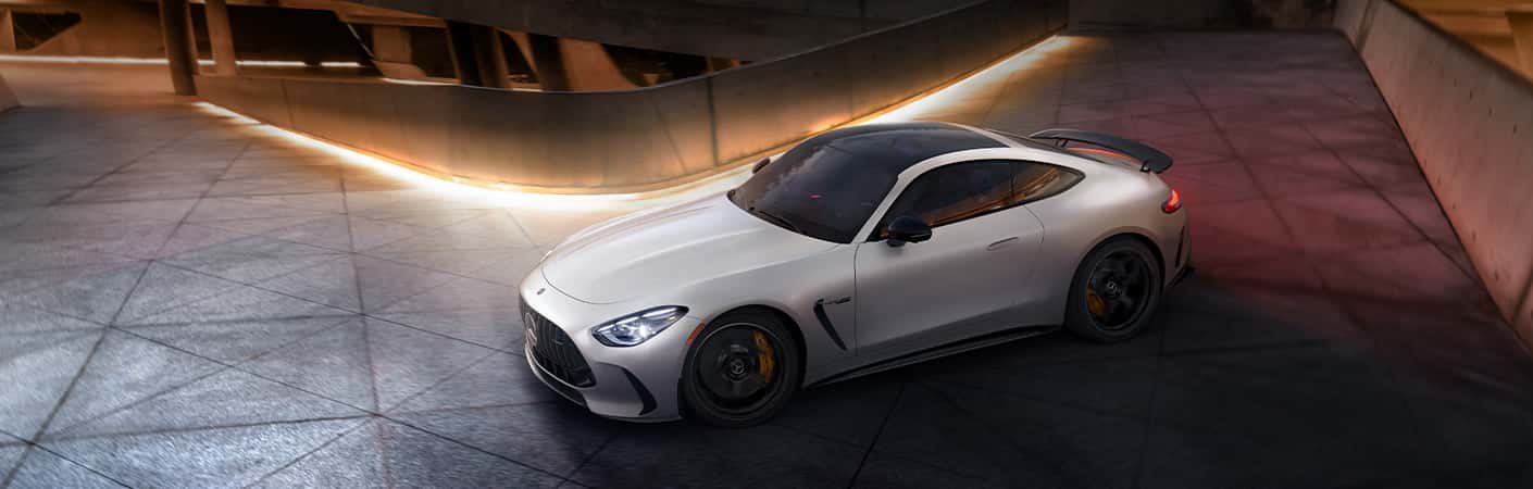2026 AMG GT driving in a parking garage