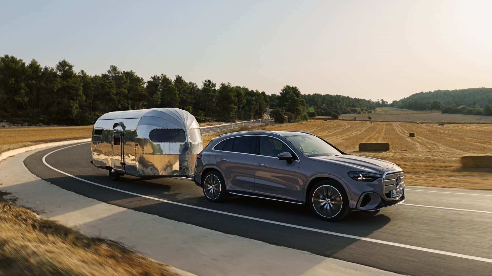 2026 mercedes-benz glc suv hauling a silver bullet trailer