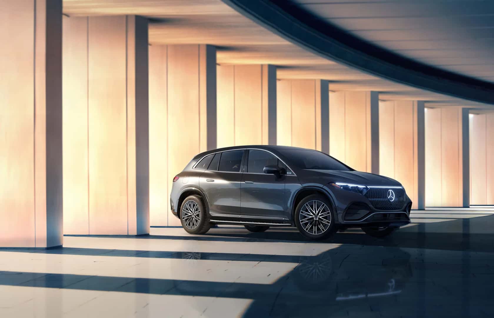2026 Mercedes-Benz EQS SUV luxury electric vehicle driving efficiently on a highway