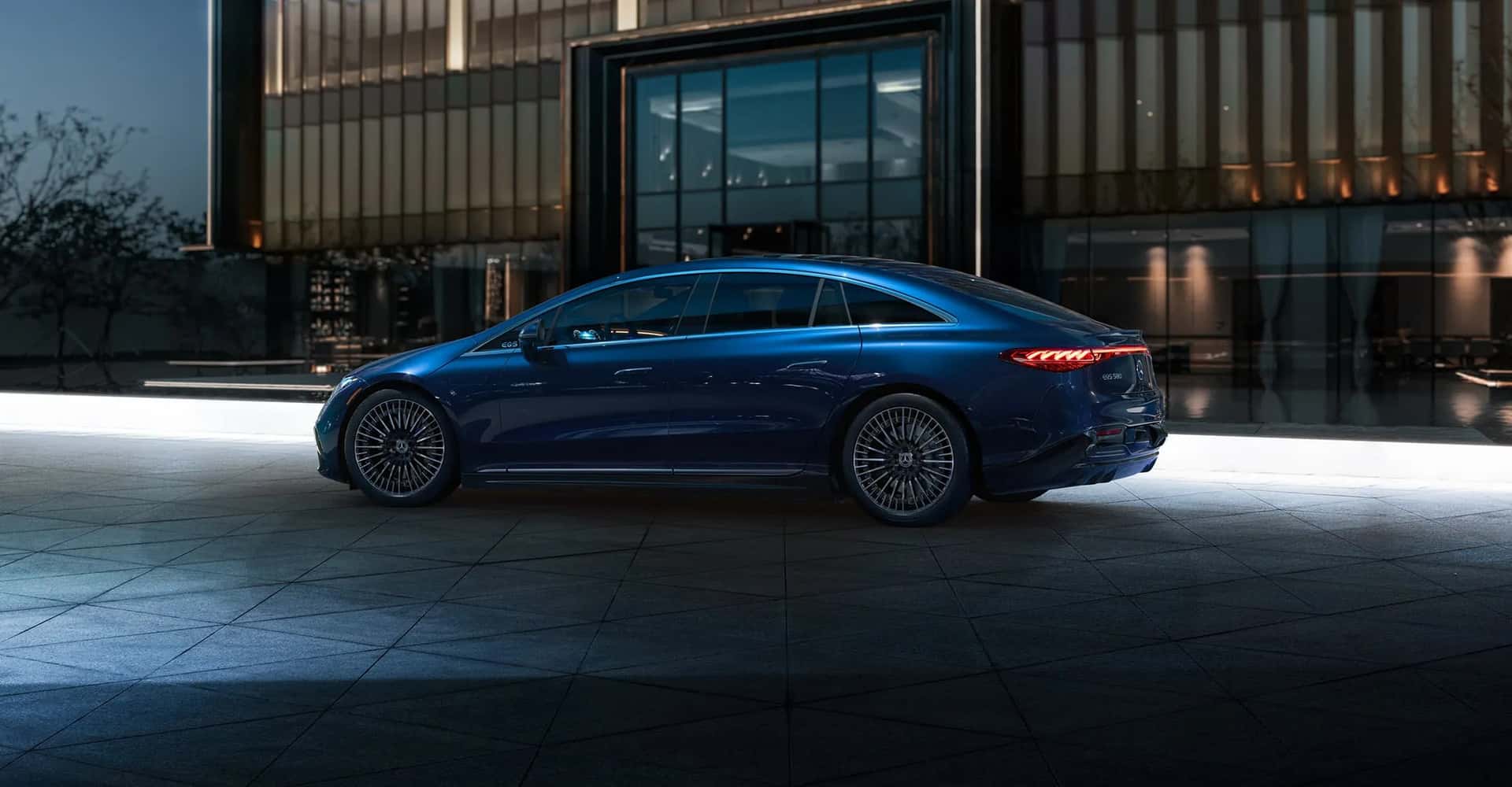 A sleek silver 2026 Mercedes-Benz EQS Sedan parked outdoors.