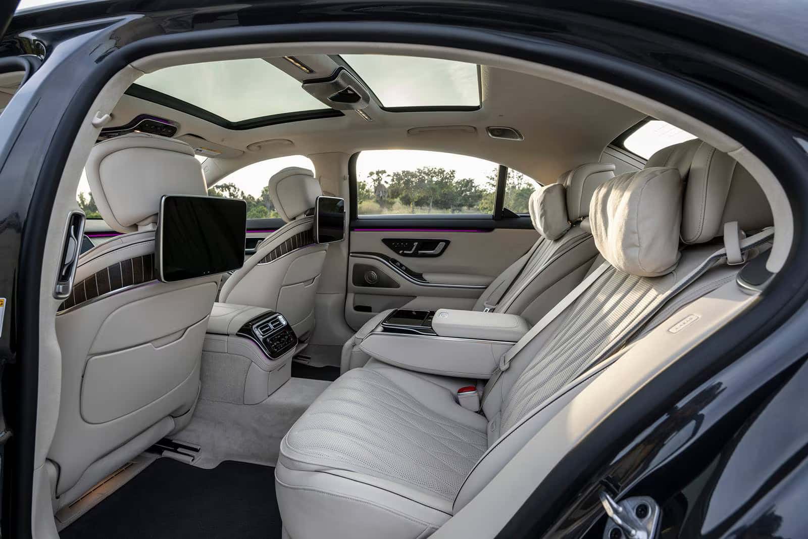 Luxury rear seating with climate and entertainment controls in the S-Class.