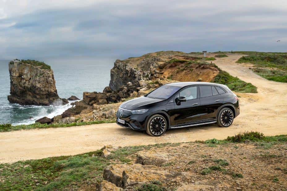 2026 Mercedes-AMG EQE SUV driving on a winding road