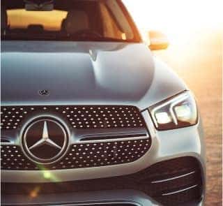 Mercedes-Benz vehicle with the sun in the background