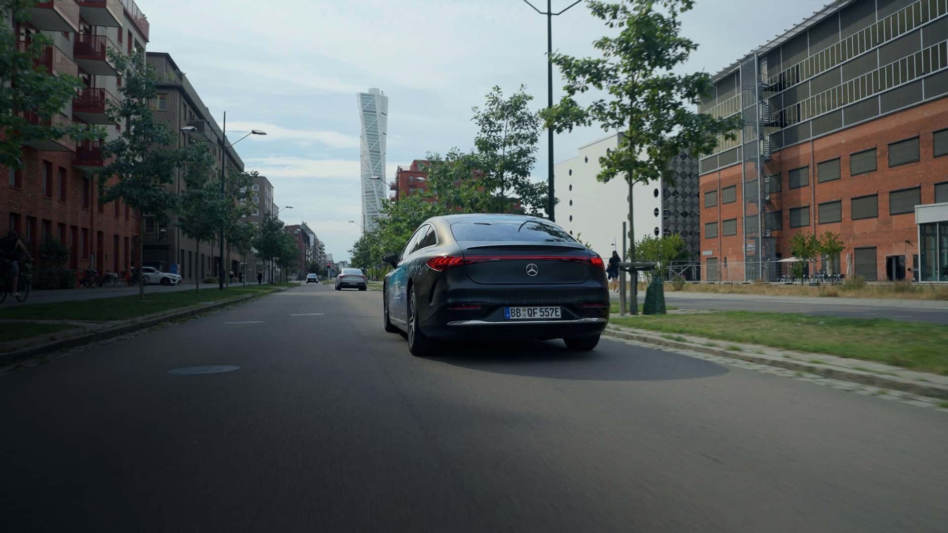 Mercedes Benz EQS rear view in motion
