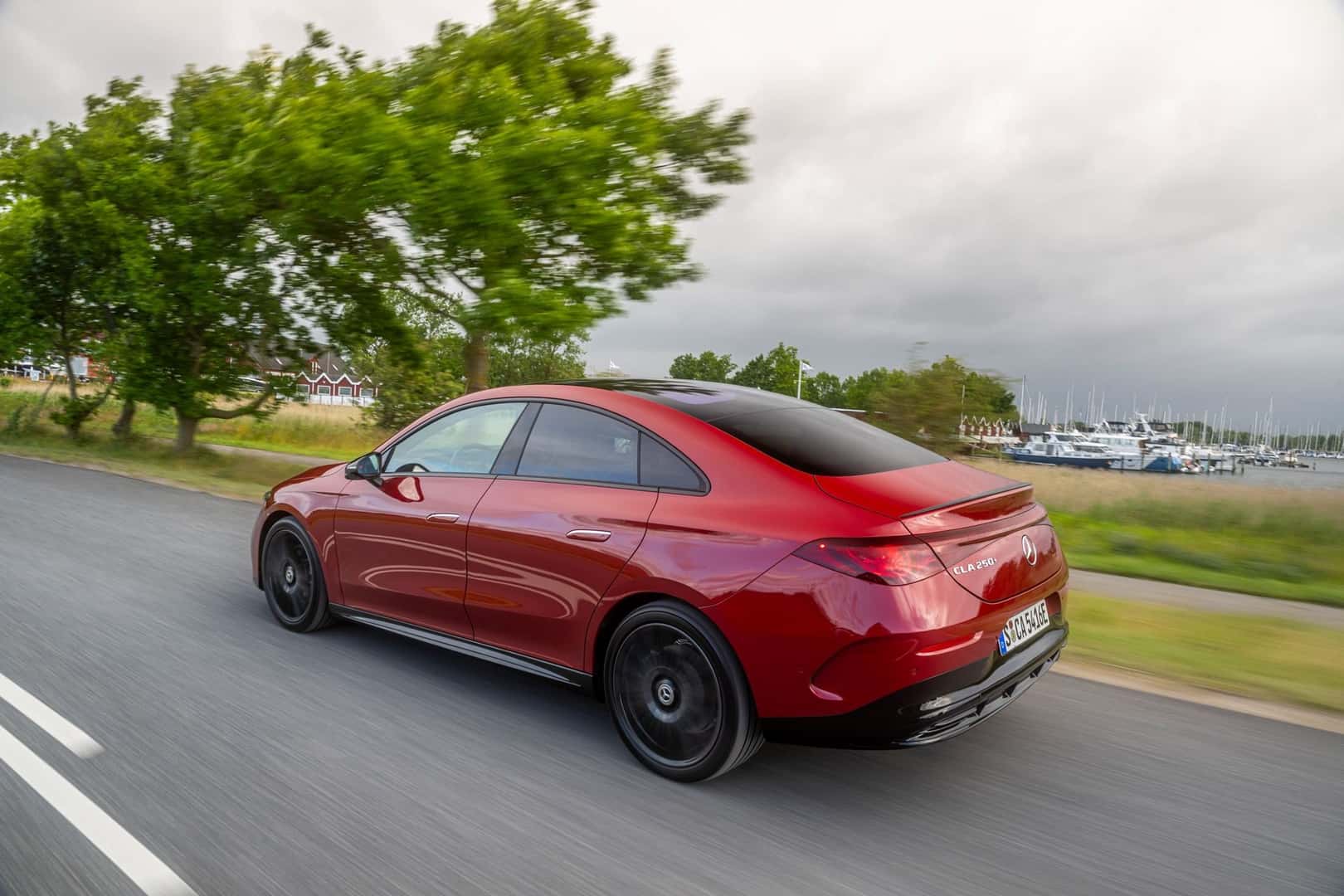 2026 Mercedes-Benz CLA EV Driver and Rear 3/4 View
