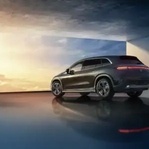 2026 Mercedes-Benz EQS SUV Driver's Side and Passenger Profile Facing Cloudy Sky