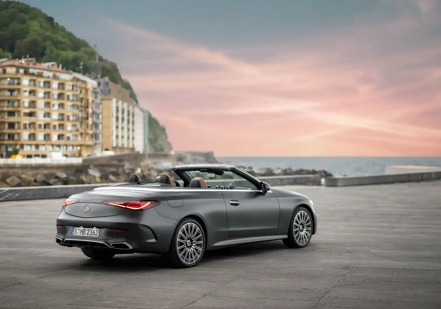 View of the rear Mercedes-Benz CLE Cabriolet parked off road looking at the water
