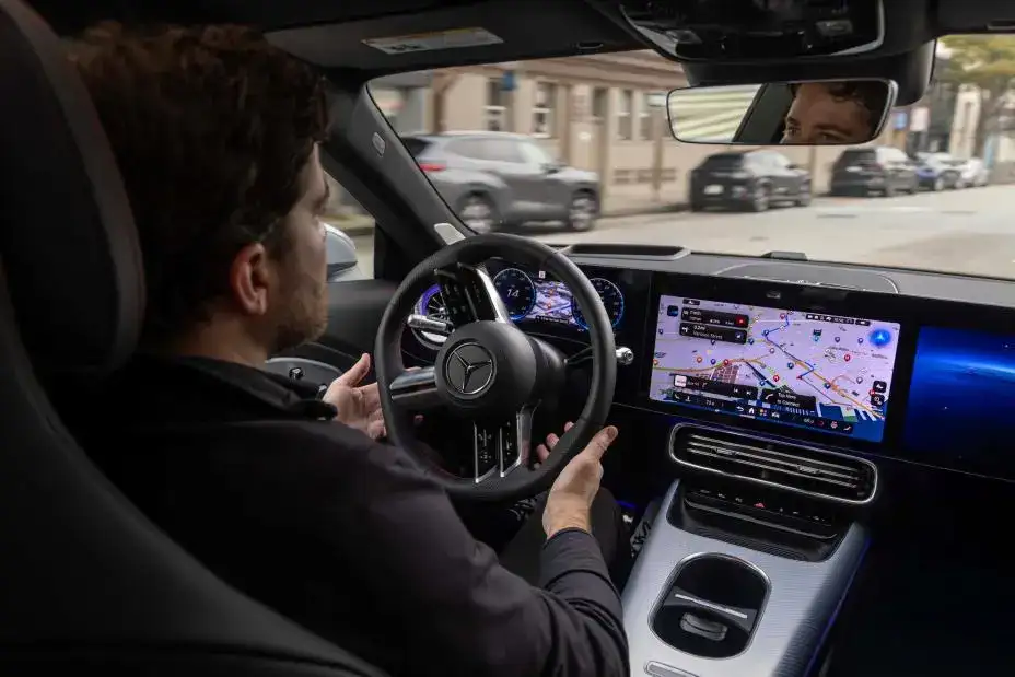 2026 Mercedes-Benz CLA with a driver in the city