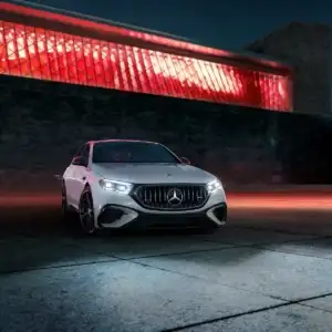 2026 Mercedes Benz E Class Sedan AMG E 53 HYBRID MANUFAKTUR Moonlight White at night