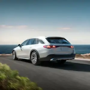 2026 Mercedes Benz E Class Wagon E 450 4MATIC All Terrain white in motion