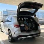 2026 Mercedes-Benz GLC SUV with open tailgate in event venue parking garage in Frisco Texas