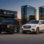 2026 Mercedes-Benz G 550 and 2026 Mercedes-Benz GLS 450 side by side at dusk near the Legacy West district in Plano, TX