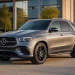 2026 Mercedes-Benz GLE in Selenite Grey Metallic parked in Plano, TX under warm afternoon sunlight