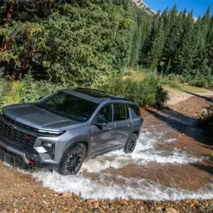2026 Chevrolet Traverse Sterling Gray Metallic driving through water