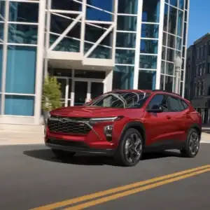 2026 Chevrolet Trax 2RS Apex Red in a city