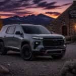 2026 Chevrolet Traverse Z71 parked at night near a historic Nevada stone building, ready for a Carson City haunted attraction outing