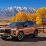 2026 Chevrolet Equinox on Carson Valley Scenic Drive in fall with Sierra Nevada and golden autumn foliage in the background