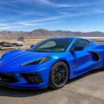 2026 Chevrolet Corvette Stingray on the tarmac at Carson City Airport in October sunlight