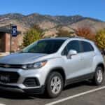 2019 Chevrolet Trax in a college campus parking lot with Sierra Nevada foothills in the background, Carson City Nevada
