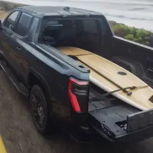 2026 GMC Sierra EV Hauling Surfboard