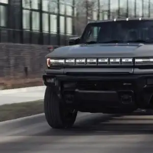 2026 GMC HUMMER EV Pickup Meteorite Metallic in motion