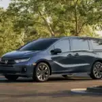 Honda Odyssey parked off road view of the front drivers side