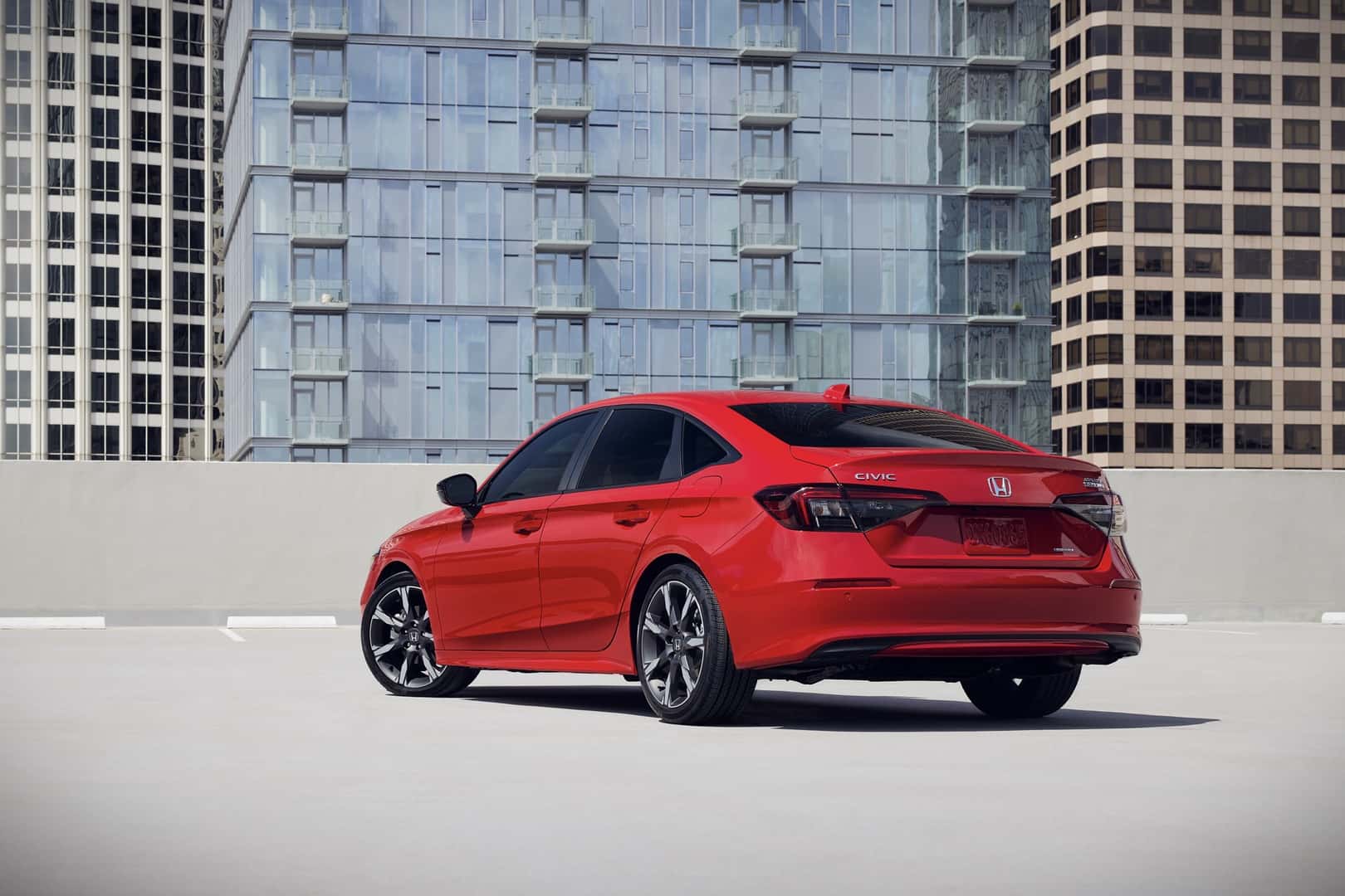 2025 Honda Civic Sedan Sport Touring Hybrid Rear Profile View
