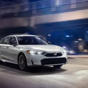 2026 Honda Civic Hybrid Sport Solar Silver Metallic in motion