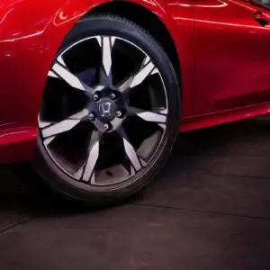 2026 Honda Civic Sedan Sport Touring Hybrid Rallye Red tires