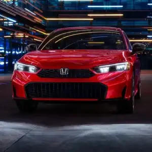 2026 Honda Civic Sedan Sport Touring Hybrid Rallye Red front view