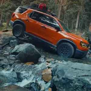 2026 Honda Passport Sunset Orange in the Woods