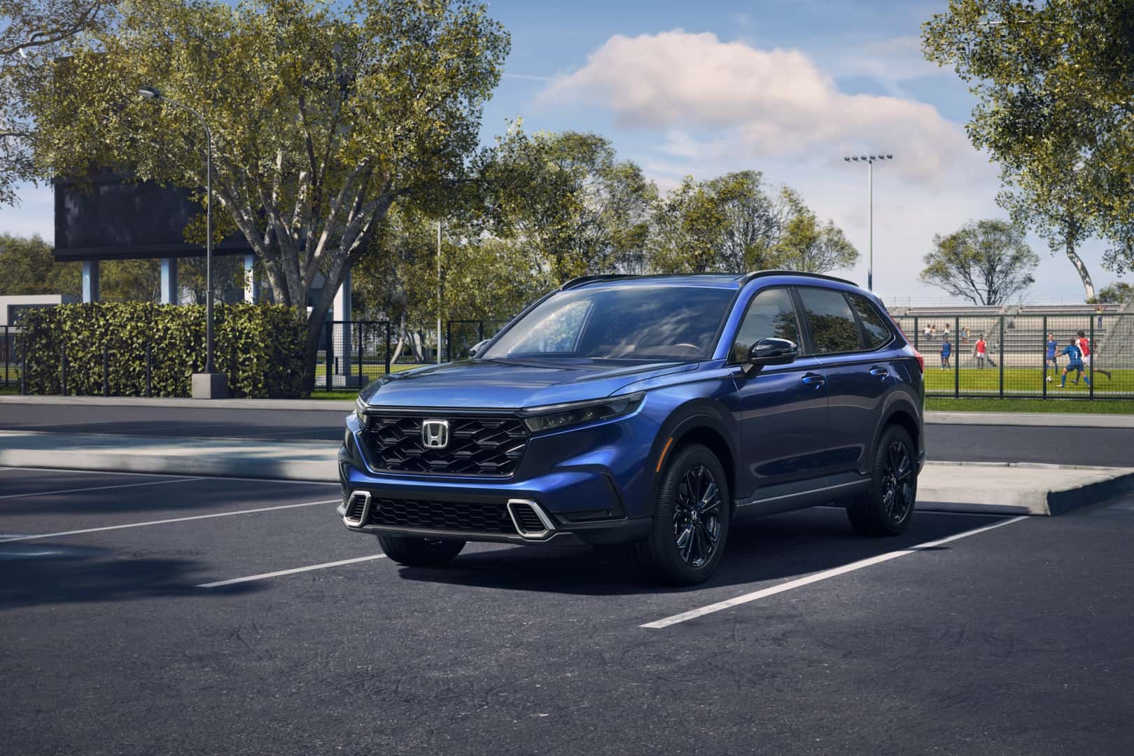 The Spacious and Attractive Blue Honda CR-V Sport Touring Hybrid, Parked Epically At A Sports Park